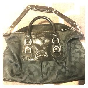 Genuine Black *Coach* Purse. Price negotiable